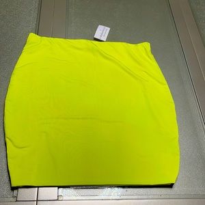 Neon green mini skirt
